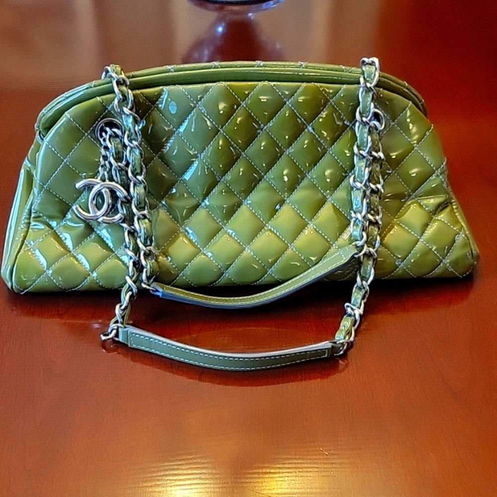 Chanel mademoiselle bag. Size medium 14 x6,5 inches. Color khaki or green.